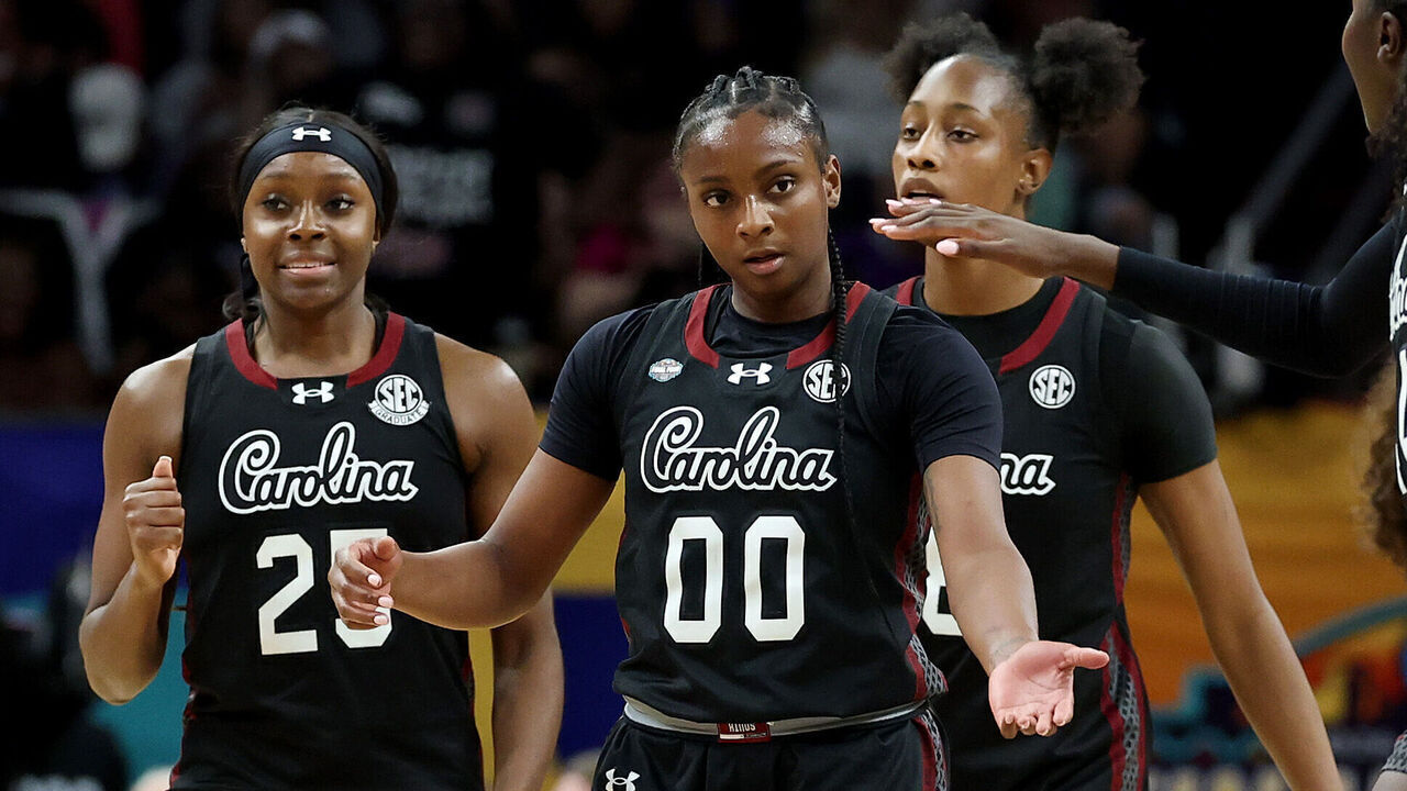 PHOENIX, ARIZONA - APRIL 03: Ta'niya Latson #00 and Agot Makeer #44 of the South Carolina Gamecocks high five during the fourth quarter against the UConn Huskies in the Final Four of the NCAA Women's Basketball Tournament at Mortgage Matchup Center on April 03, 2026 in Phoenix, Arizona.