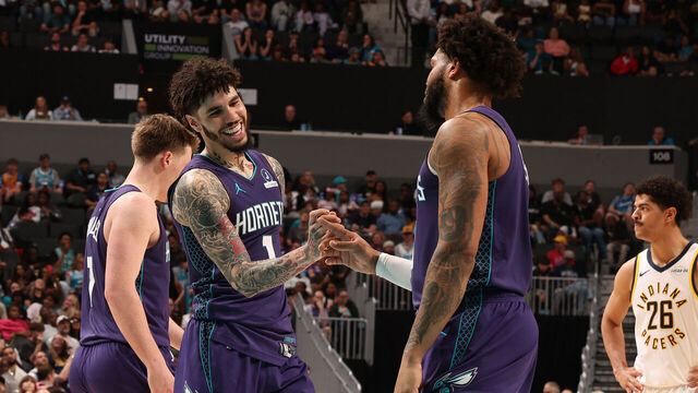 CHARLOTTE, NC - APRIL 3: LaMelo Ball #1 of the Charlotte Hornets high fives teammate during the game against the Indiana Pacers on April 3, 2026 at Spectrum Center in Charlotte, North Carolina. Mandatory Copyright Notice: Copyright 2026 NBAE