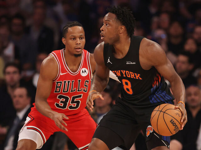 NEW YORK, NEW YORK - APRIL 03: OG Anunoby #8 of the New York Knicks dribbles the ball against Isaac Okoro #35 of the Chicago Bulls during the first quarter at Madison Square Garden on April 03, 2026 in New York City.