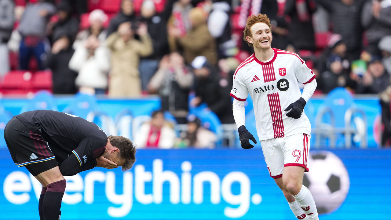 TORONTO, CANADA - APRIL 4: Josh Sargent #9 of the Toronto FC smiles after Colorado Rapids scored an own goal beside Rob Holding #6 during the second half of their MLS soccer match at BMO Field on April 4, 2026 in Toronto, Ontario, Canada.