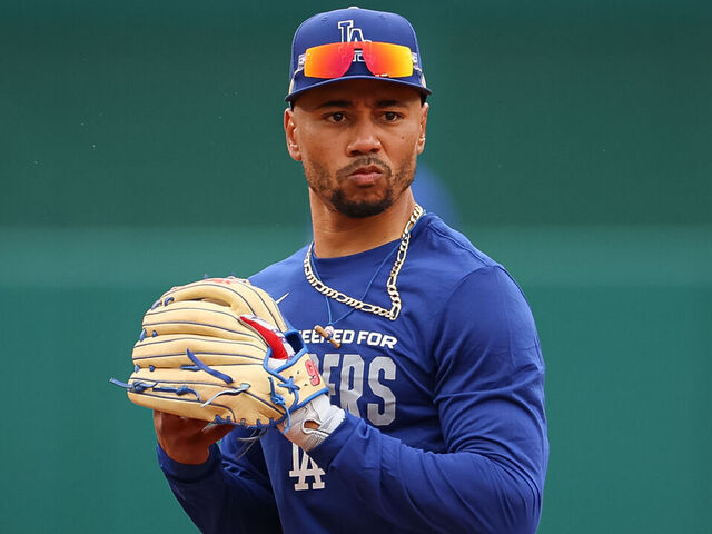 WASHINGTON, DC - APRIL 03: Mookie Betts #50 of the Los Angeles Dodgers warms up before the game against the Washington Nationals at Nationals Park on April 3, 2026 in Washington, DC.