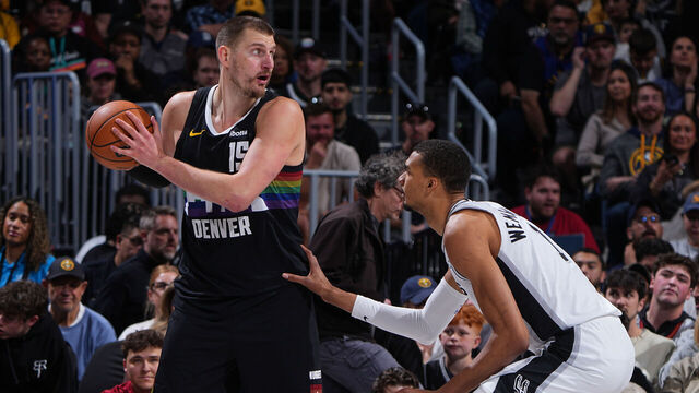 DENVER, CO - APRIL 4: Nikola Jokic #15 of the Denver Nuggets handles the ball during the game against the San Antonio Spurs on April 4, 2026 at Ball Arena in Denver, Colorado. NOTE TO USER: User expressly acknowledges and agrees that, by downloading and/or using this Photograph, user is consenting to the terms and conditions of the Getty Images License Agreement. Mandatory Copyright Notice: Copyright 2026 NBAE