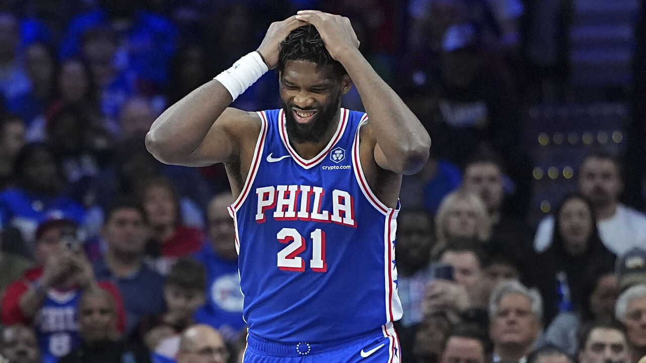PHILADELPHIA, PENNSYLVANIA - MARCH 25: Joel Embiid #21 of the Philadelphia 76ers reacts against the Chicago Bulls at Xfinity Mobile Arena on March 25, 2026 in Philadelphia, Pennsylvania.