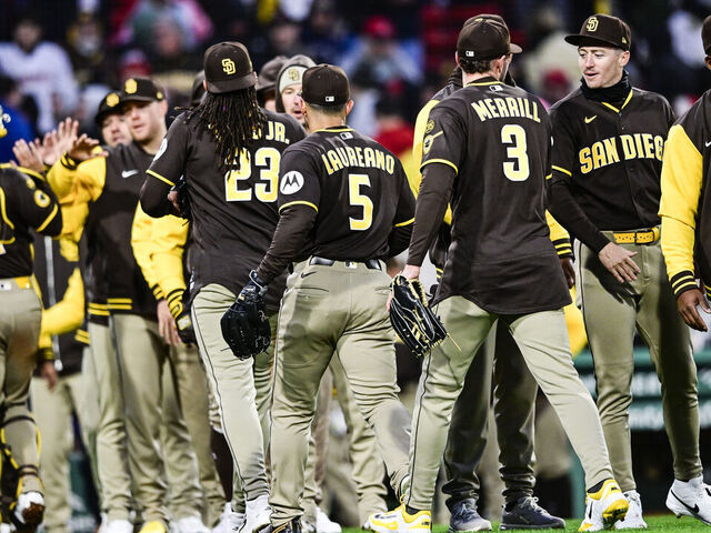 BOSTON, MASSACHUSETTS - APRIL 04: Members of the San Diego Padres celebrate their ninth inning win over the Boston Red Sox at Fenway Park on April 04, 2026 in Boston, Massachusetts.