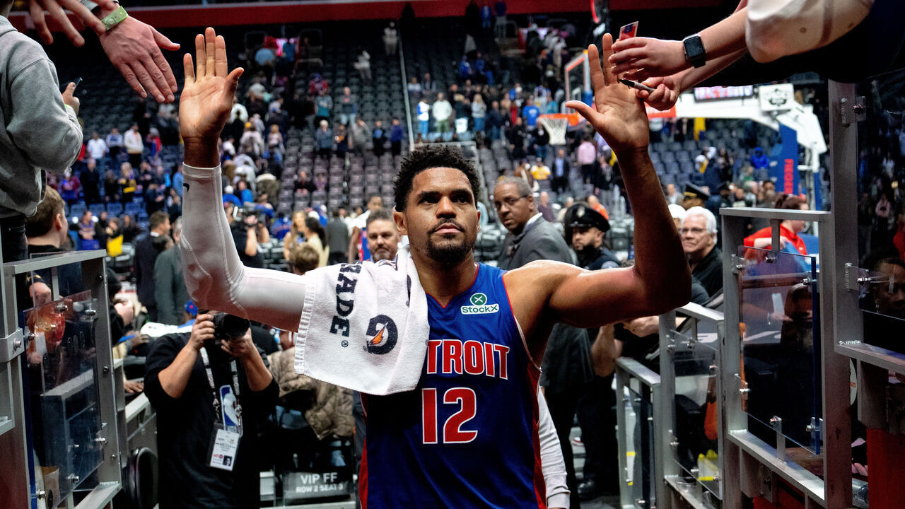 DETROIT, MICHIGAN - MARCH 23: Tobias Harris #12 of the Detroit Pistons high fives fans after the win against the Los Angeles Lakers at Little Caesars Arena on March 23, 2026 in Detroit, Michigan.