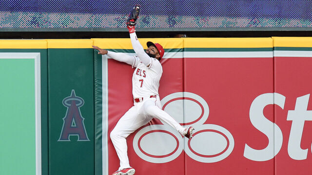 ANAHEIM, CALIFORNIA - APRIL 04: Jo Adell #7 of the Los Angeles Angels catches a fly ball hit by Cal Raleigh #29 of the Seattle Mariners during the first inning of the baseball game at Angel Stadium of Anaheim on April 04, 2026 in Anaheim, California.