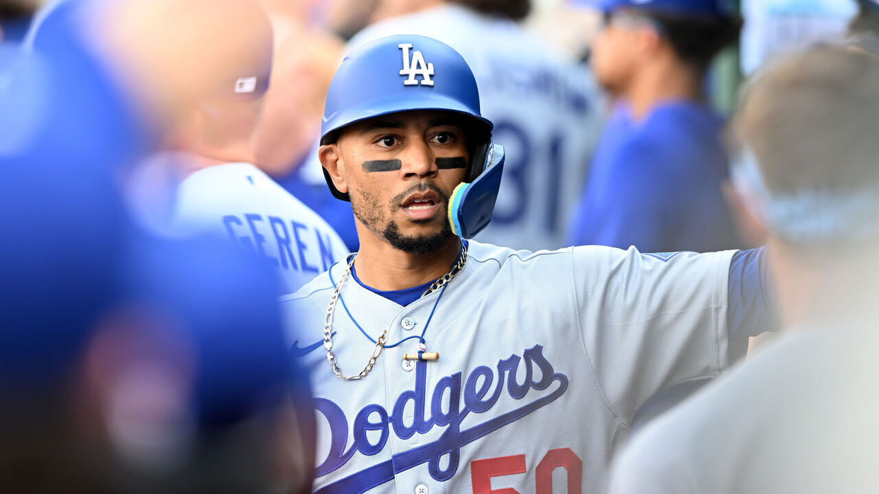 WASHINGTON, DC - APRIL 04: Mookie Betts #50 of the Los Angeles Dodgers celebrates with teammates after scoring in the first inning against the Washington Nationals at Nationals Park on April 04, 2026 in Washington, DC.