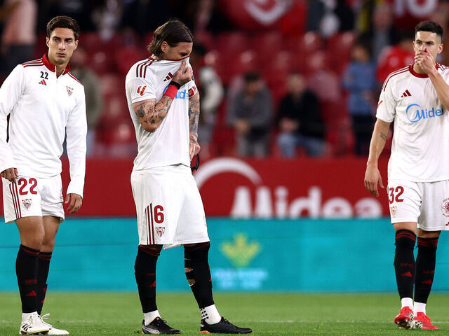 SEVILLE, SPAIN - MARCH 21: Federico Gattoni, Nemanja Gudelj and Andres Castrin of Sevilla FC react after the team's defeat in the LaLiga EA Sports match between Sevilla FC and Valencia CF at Estadio Ramon Sanchez Pizjuan on March 21, 2026 in Seville, Spain.