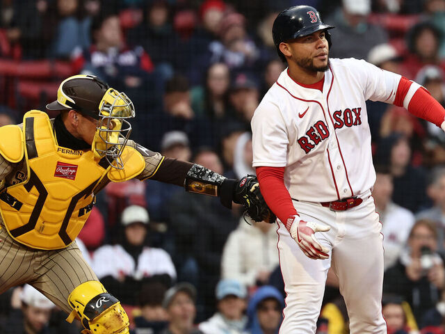 BOSTON, MA - APRIL 5: Catcher Freddy Fermin #54 of the San Diego Padres tags out Willson Contreras #40 of the Boston Red Sox after he struck out to end the game at Fenway Park on April 5, 2026 in Boston, Massachusetts.