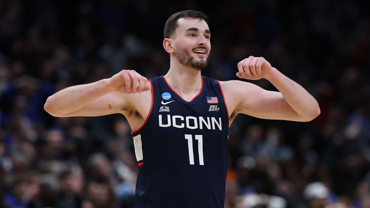 WASHINGTON, DC - MARCH 29: Alex Karaban #11 of the UConn Huskies reacts after defeating the Duke Blue Devils 73-72 in the Elite Eight of the 2026 NCAA Men's Basketball Tournament at Capital One Arena on March 29, 2026 in Washington, DC.