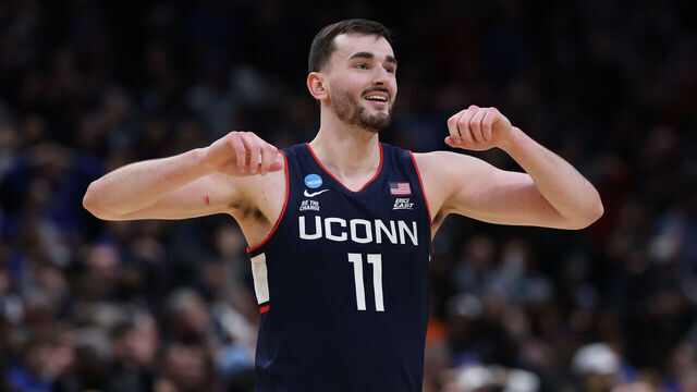 WASHINGTON, DC - MARCH 29: Alex Karaban #11 of the UConn Huskies reacts after defeating the Duke Blue Devils 73-72 in the Elite Eight of the 2026 NCAA Men's Basketball Tournament at Capital One Arena on March 29, 2026 in Washington, DC.