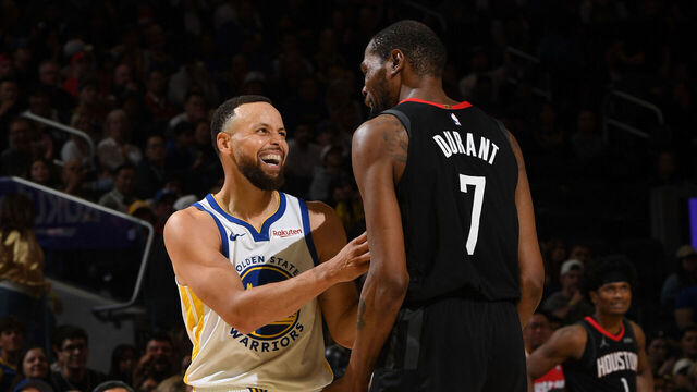 SAN FRANCISCO, CA - APRIL 5: Stephen Curry #30 of the Golden State Warriors and Kevin Durant #7 of the Houston Rockets smiles during the game on April 5, 2026 at Chase Center in San Francisco, California. NOTE TO USER: User expressly acknowledges and agrees that, by downloading and or using this photograph, user is consenting to the terms and conditions of Getty Images License Agreement. Mandatory Copyright Notice: Copyright 2026 NBAE