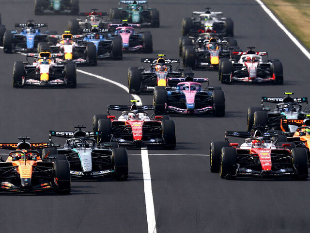 SUZUKA, JAPAN - MARCH 29: Oscar Piastri of Australia driving the (81) McLaren MCL40 Mercedes leads George Russell of Great Britain driving the (63) Mercedes AMG Petronas F1 Team W17 Charles Leclerc of Monaco driving the (16) Scuderia Ferrari SF-26 and the rest of the field at the start during the F1 Grand Prix of Japan at Suzuka Circuit on March 29, 2026 in Suzuka, Japan.
