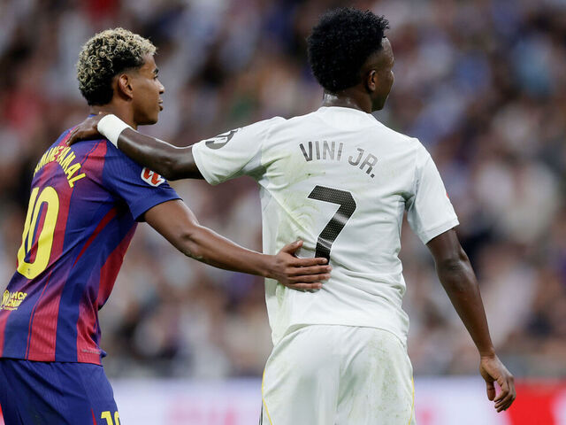 MADRID, SPAIN - OCTOBER 26: (L-R) Lamine Yamal of FC Barcelona, Vinicius Junior of Real Madrid during the LaLiga EA Sports match between Real Madrid v FC Barcelona at the Estadio Santiago Bernabeu on October 26, 2025 in Madrid Spain