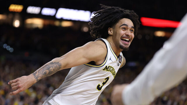 INDIANAPOLIS, INDIANA - APRIL 06: Elliot Cadeau #3 of the Michigan Wolverines celebrates after defeating the UConn Huskies 69-63 in the National Championship of the 2026 NCAA Men's Basketball Tournament at Lucas Oil Stadium on April 06, 2026 in Indianapolis, Indiana.