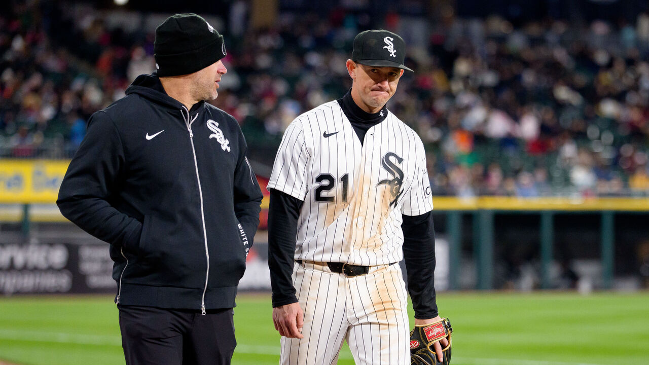 CHICAGO, ILLINOIS - APRIL 6: Austin Hays #21 of the Chicago White Sox is helped off the field after an injury in a game against the Baltimore Orioles at Rate Field on April 6, 2026 in Chicago, Illinois.