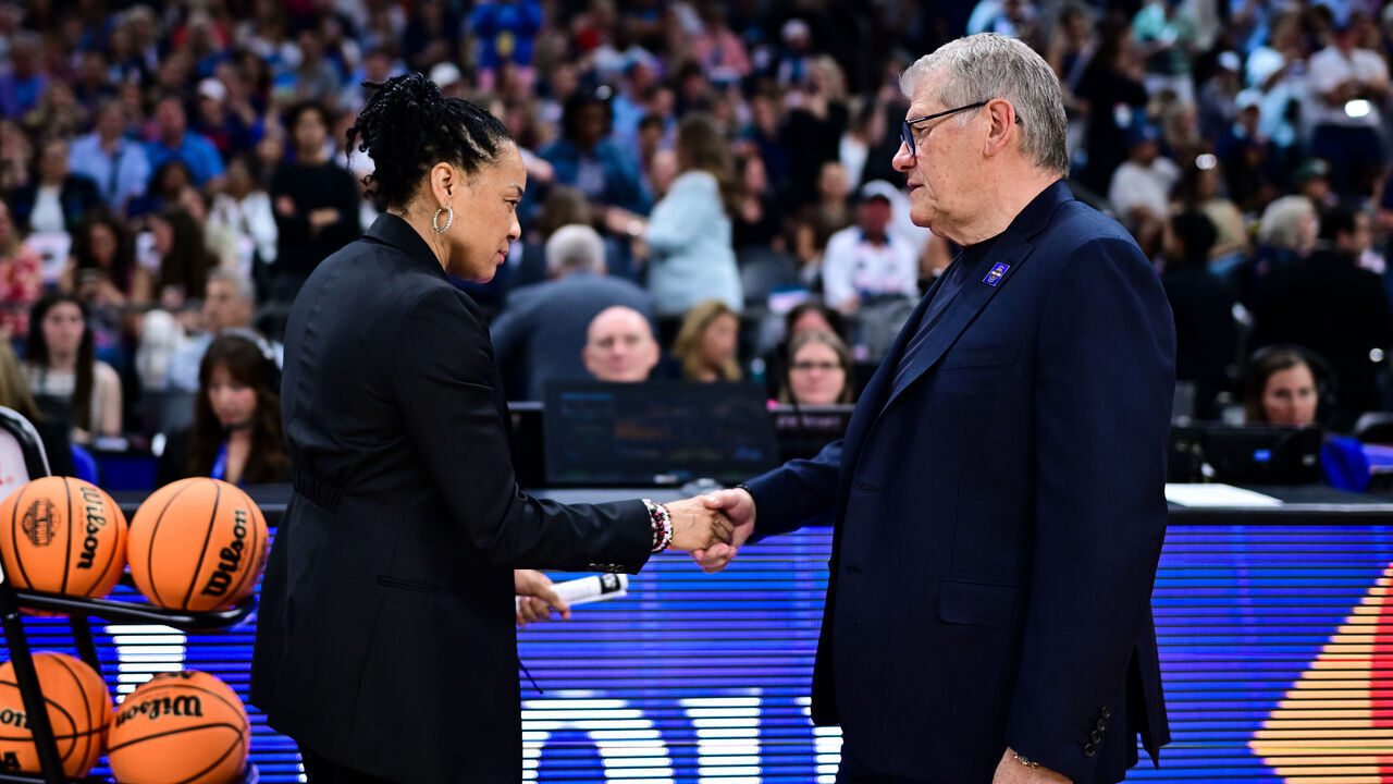 PHOENIX, ARIZONA - APRIL 3: Dawn Staley of the South Carolina Gamecocks shakes hands with Geno Auriemma of the UConn Huskies prior to a NCAA Women's Final Four semifinal game at Mortgage Matchup Center on April 3, 2026 in Phoenix, Arizona.