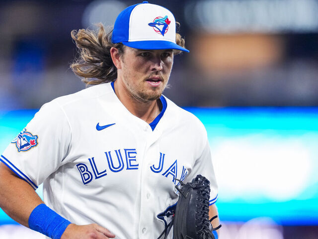 TORONTO, CANADA - MARCH 30: Addison Barger #47 of the Toronto Blue Jays comes off the field against the Colorado Rockies during the second inning in their MLB game at Rogers Centre on March 30, 2026 in Toronto, Ontario, Canada.