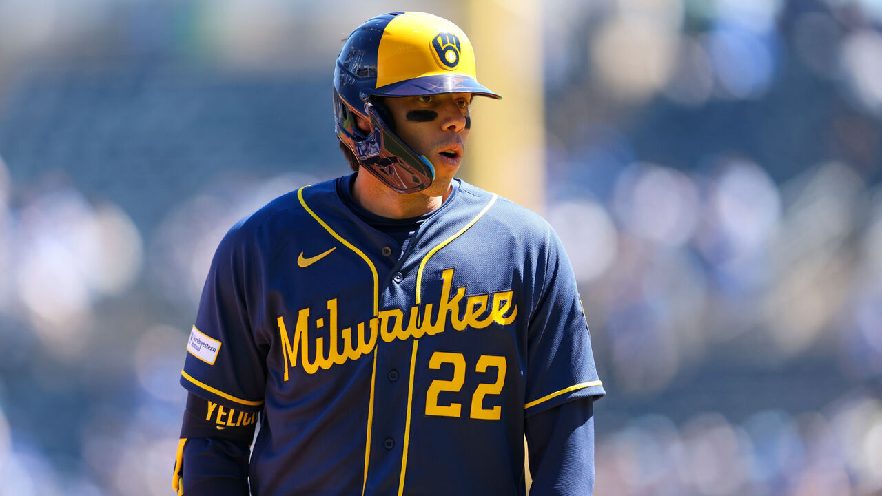 KANSAS CITY, MO - APRIL 05: Christian Yelich #22 of the Milwaukee Brewers celebrates on third base after hitting an RBI triple in the first inning during the game between the Milwaukee Brewers and the Kansas City Royals at Kauffman Stadium on Sunday, April 5, 2026 in Kansas City, Missouri.