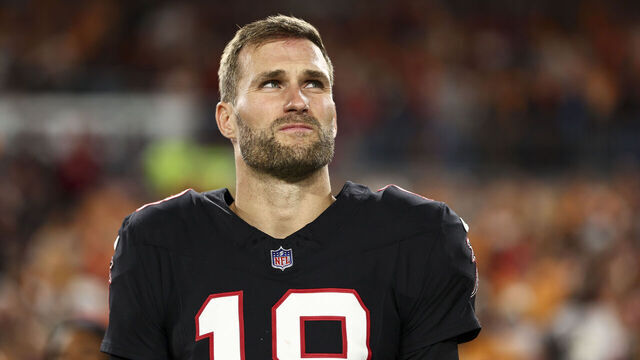 TAMPA, FLORIDA - DECEMBER 11: Kirk Cousins #18 of the Atlanta Falcons stands on the sidelines during the national anthem prior to the NFL football game against the Tampa Bay Buccaneers at Raymond James Stadium on December 11, 2025 in Tampa, Florida.