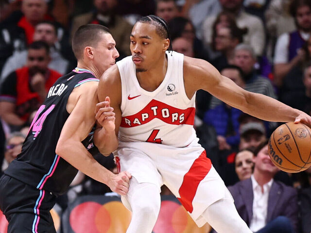 TORONTO, CANADA - APRIL 7: Scottie Barnes #4 of the Toronto Raptors dribbles the ball during the game against the Miami Heat on April 7, 2026 at the Scotiabank Arena in Toronto, Ontario, Canada. Mandatory Copyright Notice: Copyright 2026 NBAE
