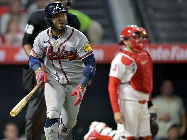 ANAHEIM, CALIFORNIA - APRIL 7: Ozzie Albies #1 of the Atlanta Braves watches the flight of the ball on a solo home run in the eighth inning against the Los Angeles Angels at Angel Stadium of Anaheim on April 7, 2026 in Anaheim, California.