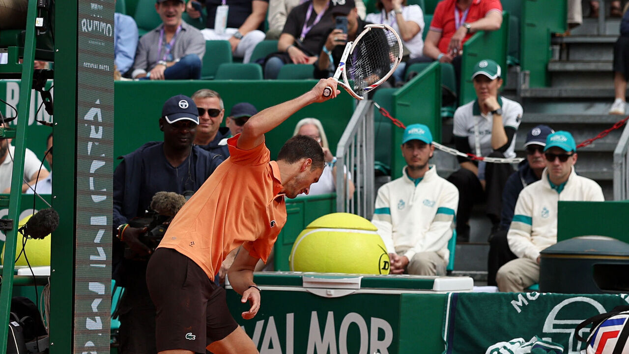 Russia's Daniil Medvedev smashes his racket on the clay as he plays against Italy's Matteo Berrettini during the Monte Carlo ATP Masters Series Tournament round of 32 tennis match on Court Rainier III at the Monte-Carlo Country Club in Roquebrune-Cap-Martin, south-eastern France on April 8, 2026.