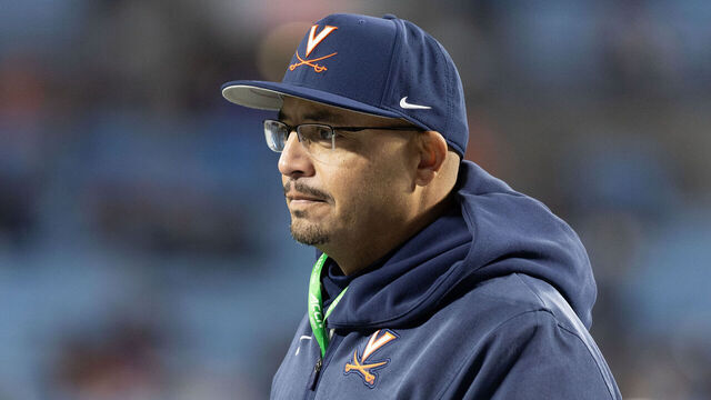 CHARLOTTE, NORTH CAROLINA - DECEMBER 6: Head coach Tony Elliott of the Virginia Cavaliers takes the field before a game against the Duke Blue Devils at Bank of America Stadium on December 6, 2025 in Charlotte, North Carolina.