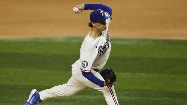 ARLINGTON, TEXAS - APRIL 7: Jacob Latz #67 of the Texas Rangers pitches against the Seattle Mariners during the seventh inning at Globe Life Field on April 7, 2026 in Arlington, Texas.