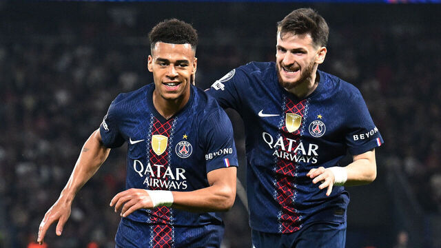 PARIS, FRANCE - APRIL 08: Desire Doue of Paris Saint-Germain celebrates scoring his team's first goal with teammate Khvicha Kvaratskhelia during the UEFA Champions League 2025/26 Quarter-Final First Leg match between Paris Saint-Germain FC and Liverpool FC at Parc des Princes on April 08, 2026 in Paris, France.