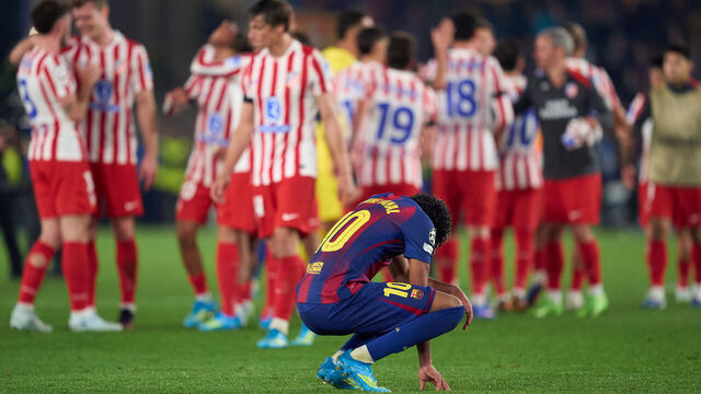 BARCELONA, SPAIN - APRIL 08: Lamine Yamal of FC Barcelona reacts by crouching with his head down, looking at the grass following his team’s defeat to Club Atlético de Madrid during the UEFA Champions League 2025/26 Quarter-Final First Leg match between FC Barcelona and Club Atlético de Madrid at Estadi Olimpic Lluis Companys on April 08, 2026 in Barcelona, Spain.