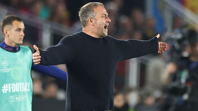 Barcelona's German coach Hans-Dieter Flick gestures on the touchline during the UEFA Champions League quarter final first leg football match between FC Barcelona and Club Atletico de Madrid at Camp Nou Stadium in Barcelona on April 8, 2026.
