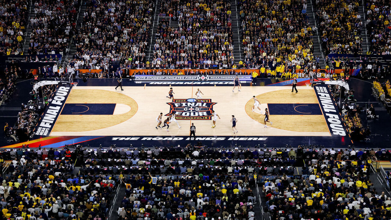INDIANAPOLIS, INDIANA - APRIL 06: (EDITORS NOTE: Image was captured using a remote camera.) A general view of Lucas Oil Stadium during the first half of a game between the UConn Huskies and the Michigan Wolverines in the National Championship of the 2026 NCAA Men's Basketball Tournament on April 06, 2026 in Indianapolis, Indiana.