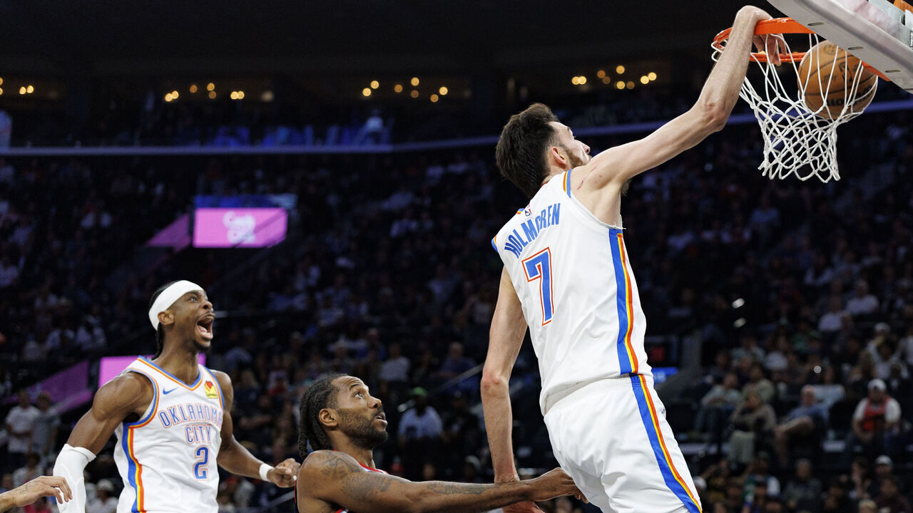 INGLEWOOD CA - APRIL 8, 2026: Oklahoma City Thunder guard Shai Gilgeous-Alexander (2) reacts as Oklahoma City Thunder center Chet Holmgren (7) dunks over LA Clippers forward Kawhi Leonard (2) in the first half at Intuit Dome on April 8, 2026 in Inglewood, CA.(Gina Ferazzi / Los Angeles Times via Getty Images)