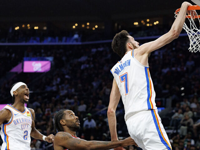 INGLEWOOD CA - APRIL 8, 2026: Oklahoma City Thunder guard Shai Gilgeous-Alexander (2) reacts as Oklahoma City Thunder center Chet Holmgren (7) dunks over LA Clippers forward Kawhi Leonard (2) in the first half at Intuit Dome on April 8, 2026 in Inglewood, CA.(Gina Ferazzi / Los Angeles Times via Getty Images)