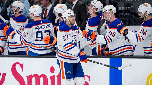 SALT LAKE CITY, UTAH - APRIL 07: Connor McDavid #97 of the Edmonton Oilers celebrates a goal with teammates during the first period against the Utah Mammoth at Delta Center on April 07, 2026 in Salt Lake City, Utah.
