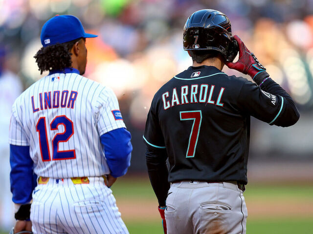NEW YORK, NY - APRIL 08: Francisco Lindor #12 of the New York Mets and Corbin Carroll #7 of the Arizona Diamondbacks talk during the game at Citi Field on Wednesday, April 8, 2026 in New York, New York.