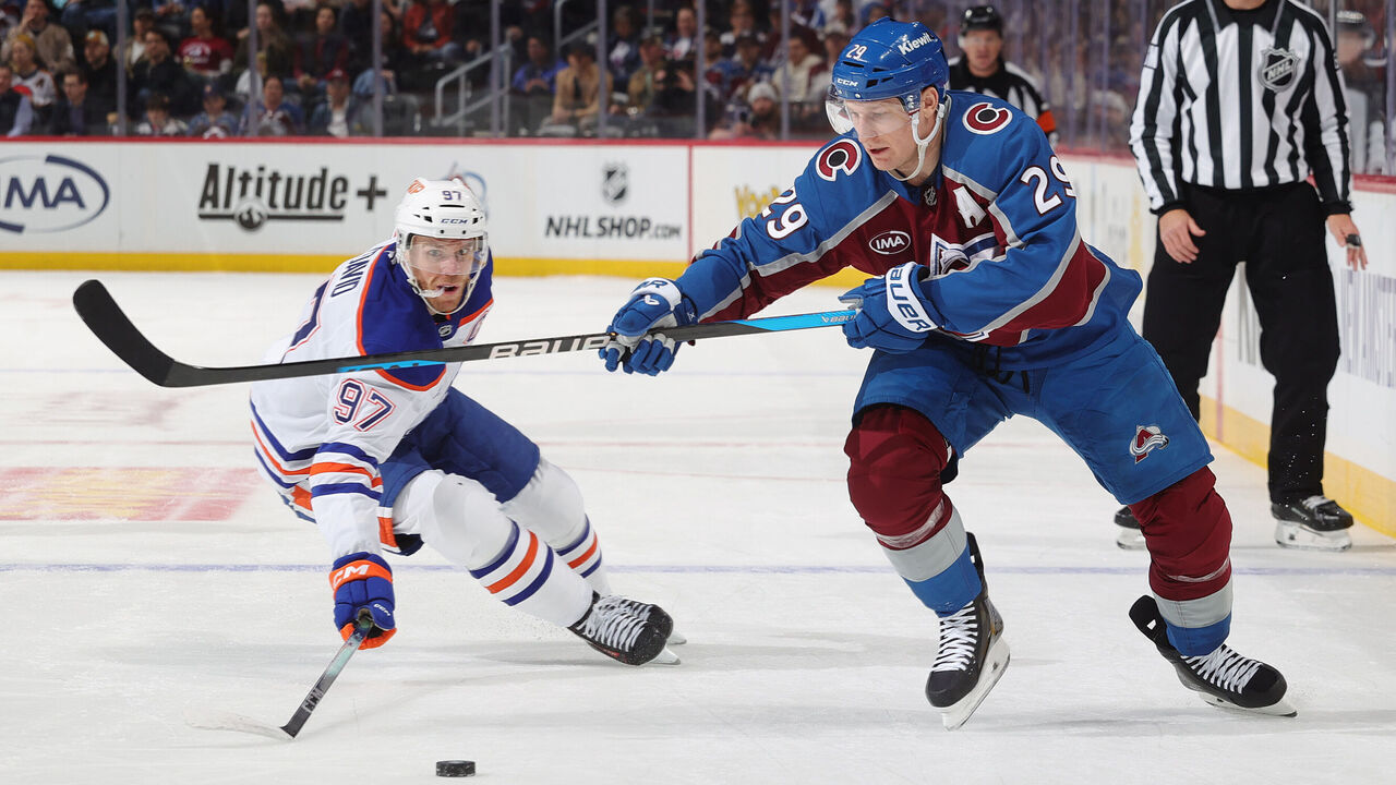 DENVER, COLORADO - MARCH 10: Nathan MacKinnon #29 of the Colorado Avalanche skates against Connor McDavid #97 of the Edmonton Oilers at Ball Arena on March 10, 2026 in Denver, Colorado.