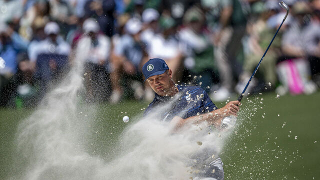 Bryson DeChambeau of the United States plays a stroke from a bunker on the No. 11 hole during the first round of the Masters at Augusta National Golf Club, Thursday, April 09, 2026.