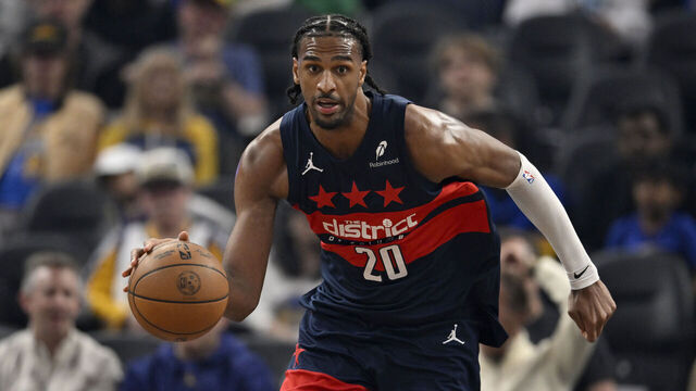 SAN FRANCISCO, CALIFORNIA - MARCH 27: Alex Sarr #20 of the Washington Wizards dribbles against the Golden State Warriors in the first quarter at Chase Center on March 27, 2026 in San Francisco, California.