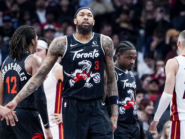 TORONTO, CANADA - APRIL 9: Brandon Ingram #3 and Scottie Barnes #4 of the Toronto Raptors celebrate against the Miami Heat during the first half at the Scotiabank Arena on April 9, 2026 in Toronto, Ontario, Canada. NOTE TO USER: User expressly acknowledges and agrees that, by downloading and/or using this Photograph, user is consenting to the terms and conditions of the Getty Images License Agreement.