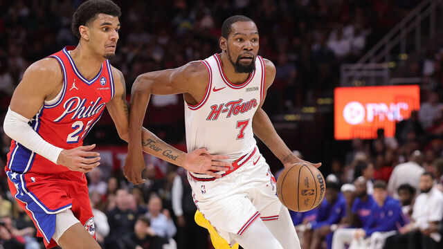HOUSTON, TEXAS - APRIL 09: Kevin Durant #7 of the Houston Rockets works against Dominick Barlow #25 of the Philadelphia 76ers during the second half at Toyota Center on April 09, 2026 in Houston, Texas.