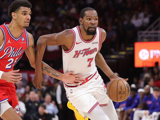 HOUSTON, TEXAS - APRIL 09: Kevin Durant #7 of the Houston Rockets works against Dominick Barlow #25 of the Philadelphia 76ers during the second half at Toyota Center on April 09, 2026 in Houston, Texas.