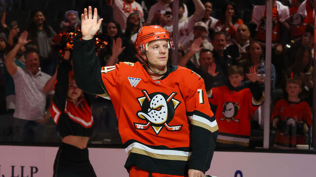 ANAHEIM, CA - APRIL 9: John Carlson #74 of the Anaheim Ducks waves to the crowd while he is recognized as the first star of the game after scoring a hat-trick in an 6-1 Anaheim victory over the San Jose Sharks in the game at Honda Center on April 9, 2026 in Anaheim, California.