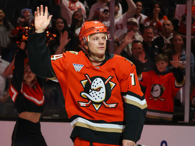 ANAHEIM, CA - APRIL 9: John Carlson #74 of the Anaheim Ducks waves to the crowd while he is recognized as the first star of the game after scoring a hat-trick in an 6-1 Anaheim victory over the San Jose Sharks in the game at Honda Center on April 9, 2026 in Anaheim, California.