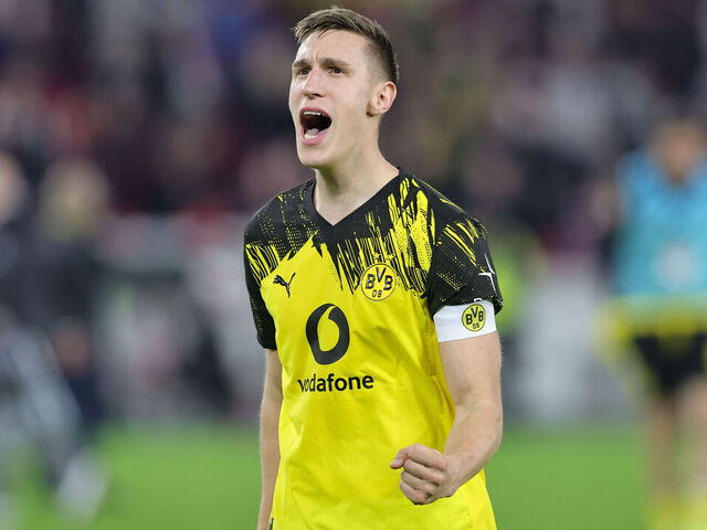 STUTTGART, GERMANY - APRIL 4: Nico Schlotterbeck of Borussia Dortmund celebrates the victory after the Bundesliga match between VfB Stuttgart and Borussia Dortmund at MHPArena on April 4, 2026 in Stuttgart, Germany.