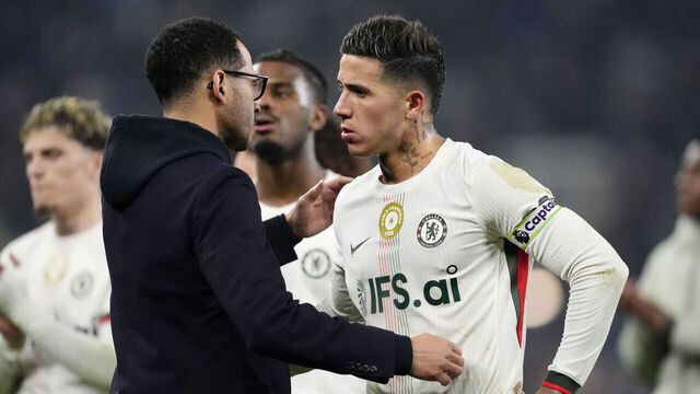 Chelsea manager Liam Rosenior (left) speaks with Enzo Fernandez on the pitch after the Premier League match at Hill Dickinson Stadium, Liverpool. Picture date: Saturday March 21, 2026.