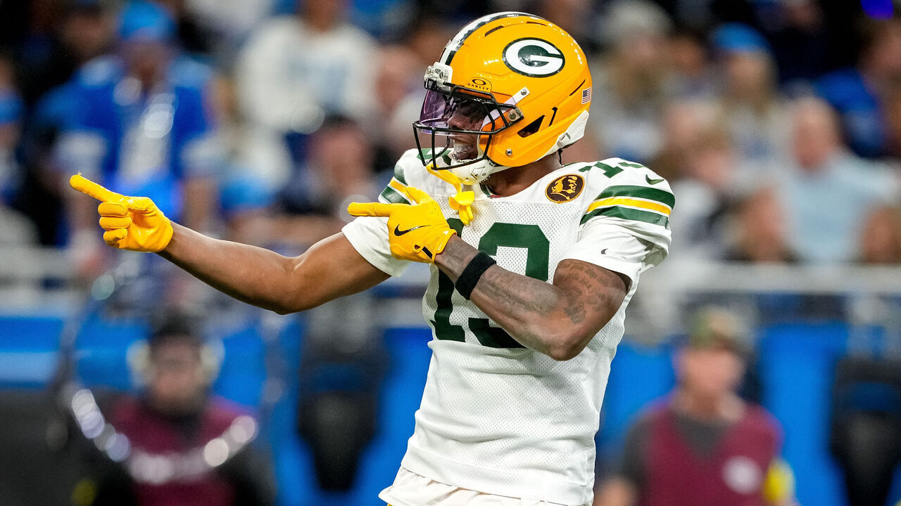 DETROIT, MICHIGAN - NOVEMBER 27: Dontayvion Wicks #13 of the Green Bay Packers reacts after a first down during the third quarter against the Detroit Lions at Ford Field on November 27, 2025 in Detroit, Michigan.