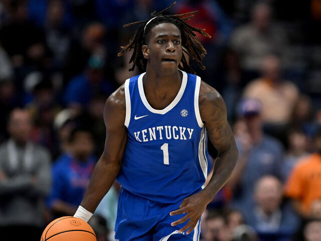 NASHVILLE, TENNESSEE - MARCH 13: Denzel Aberdeen #1 of the Kentucky Wildcats dribbles against the Florida Gators during the second half in the quarterfinal game of the 2026 SEC Men's Basketball Tournament at Bridgestone Arena on March 13, 2026 in Nashville, Tennessee.