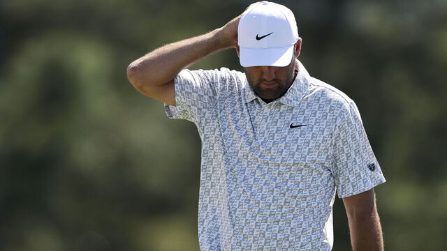 AUGUSTA, GEORGIA - APRIL 10: Scottie Scheffler of the United States reacts on the 18th green during the second round of the 2026 Masters Tournament at Augusta National Golf Club on April 10, 2026 in Augusta, Georgia.